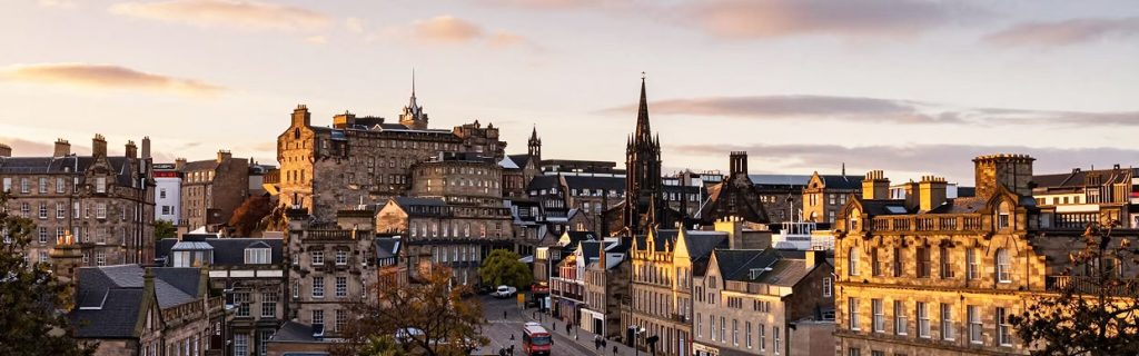 The City Apartments Edinburgh 1 Edinburgh Old Town skyline at dusk, view from Calton Hill, near The City Apartments Edinburgh